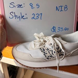 New Balance White and Black Leopard Sneakers
